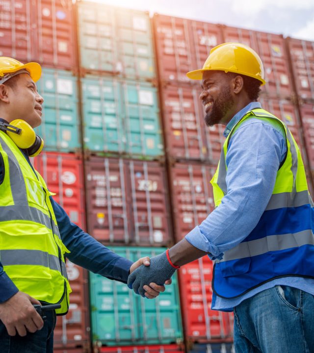 export and import business,engineer with foreman handshake at c
